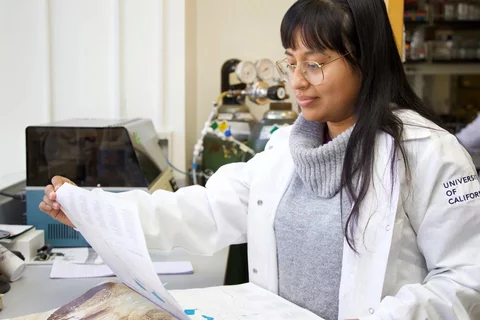 Photo of female medical student working in a lab