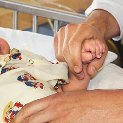 Interested in Becoming a Pediatrician? Doctor and Infant Patient