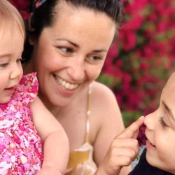 mother and daughters laughing