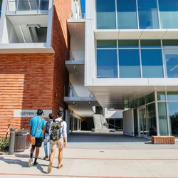 Medical school students walking into Geffen Hall