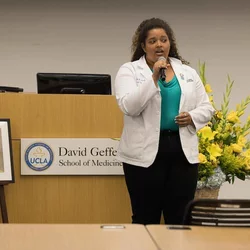 Medical school teacher speaking at event