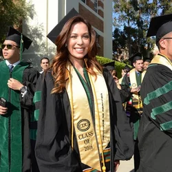 Female graduate in gown 