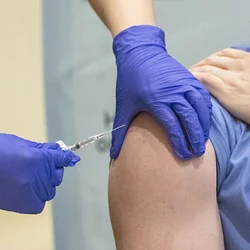 Person receiving vaccine