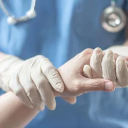 What Does An Anesthesiologist Do Doctor Holding Patient Hand