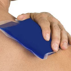 male holding shoulder from pain