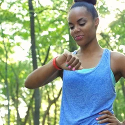 woman using fitness tracker