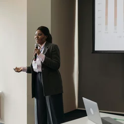 Woman with microphone public speaking